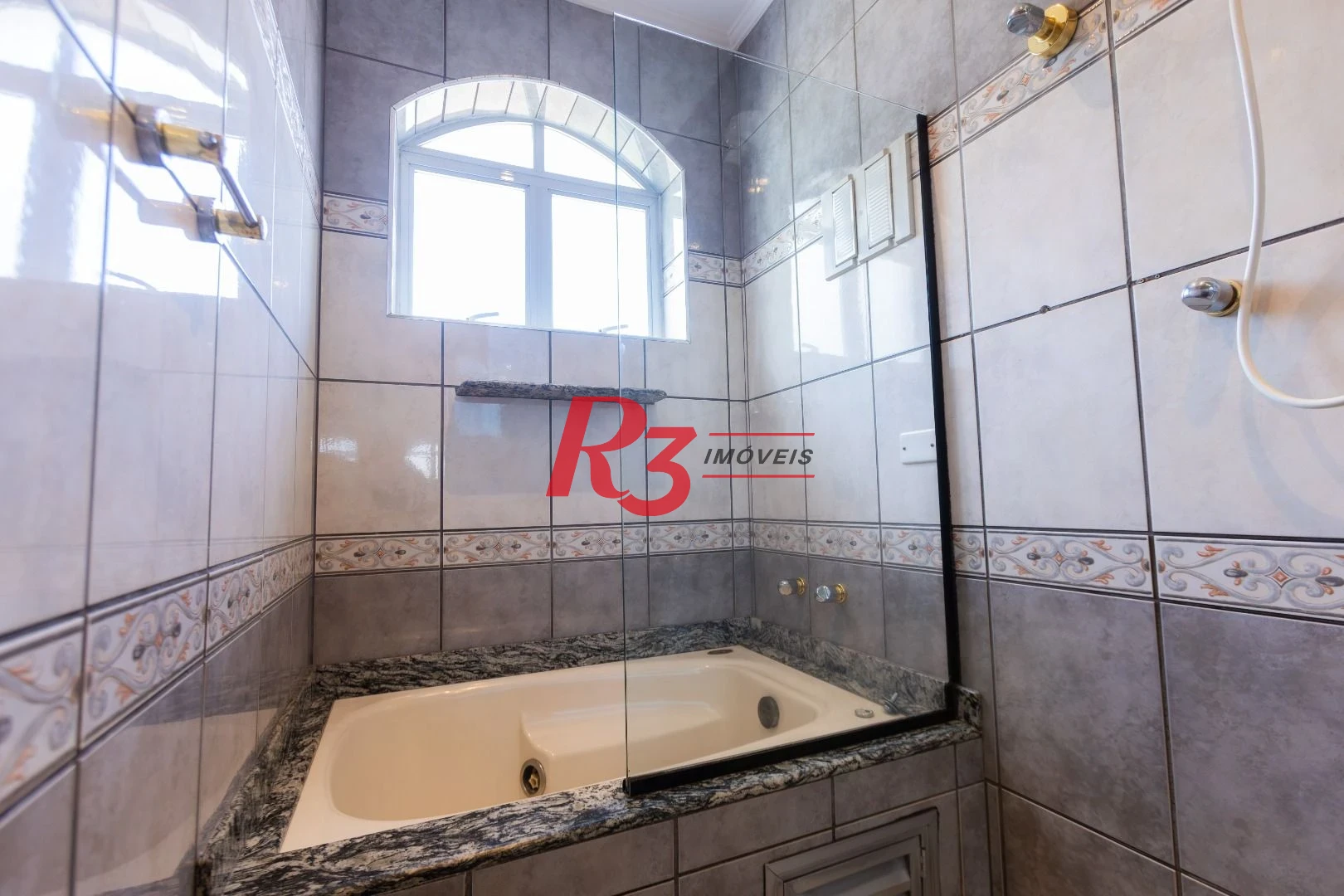 Casa com 4 dormitórios à venda, 303 m² por R$ 4.250.000,00 - Ponta da Praia - Santos/SP