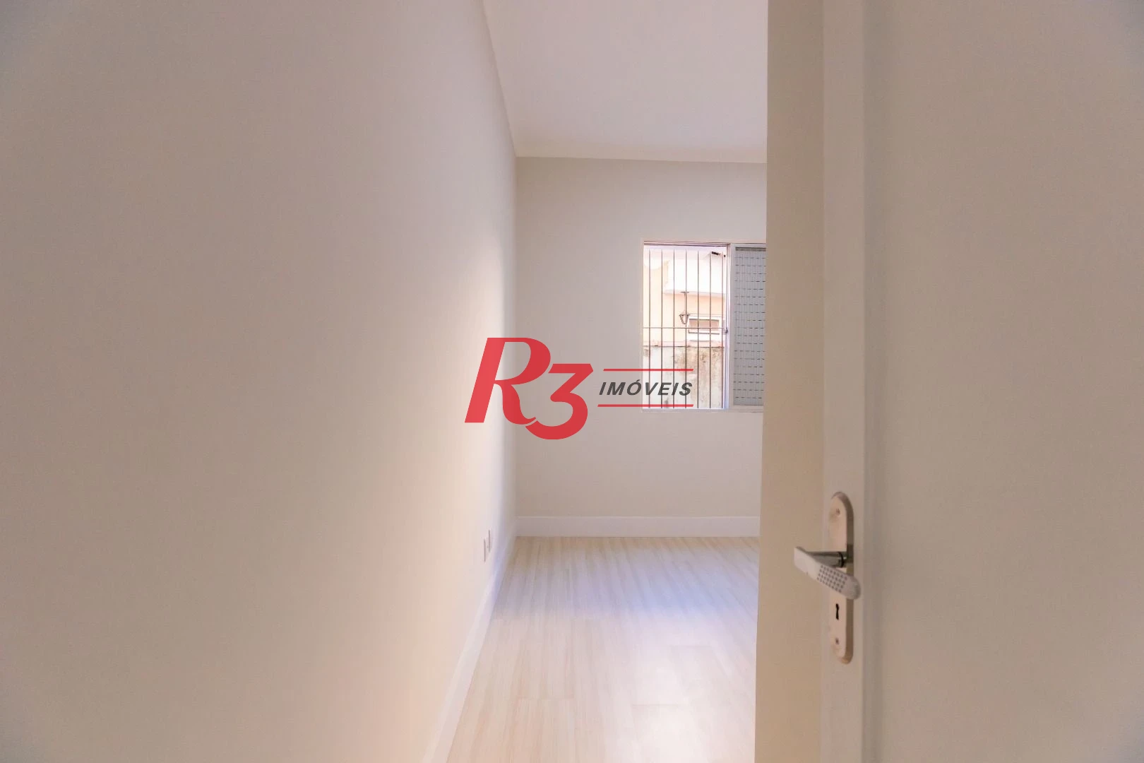 Apartamento com 2 dormitórios à venda, 65 m² por R$ 385.000,00 - Embaré - Santos/SP