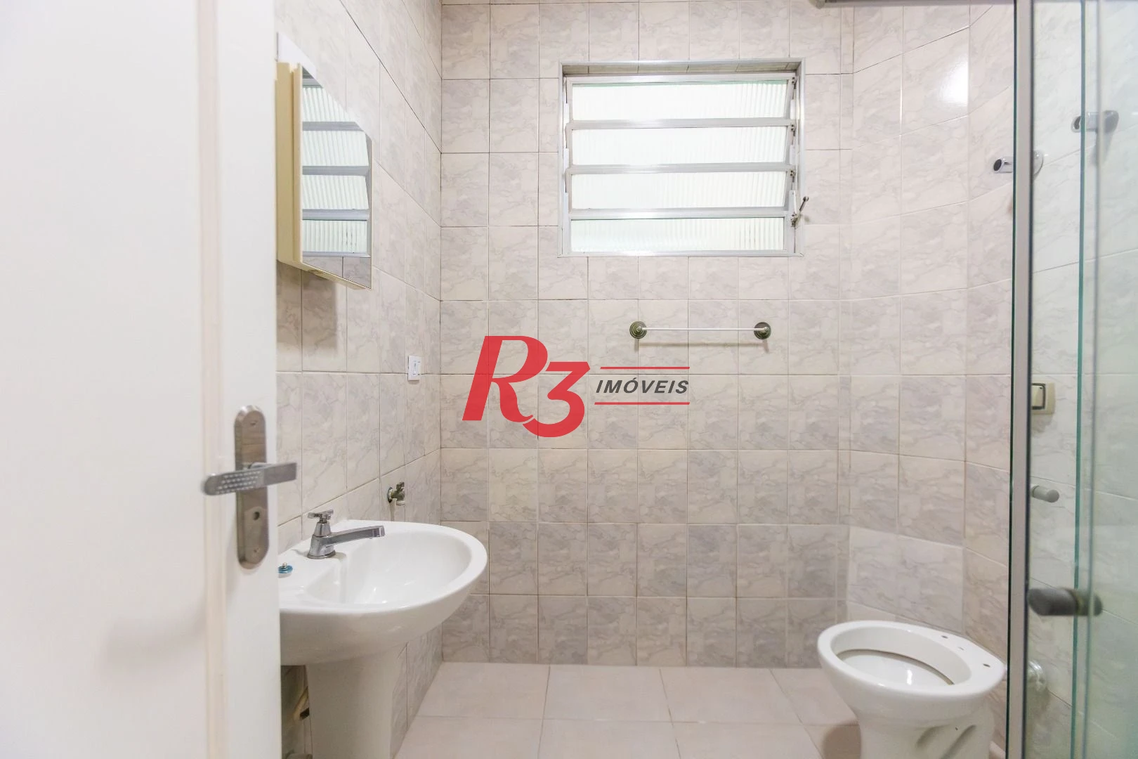 Apartamento com 2 dormitórios à venda, 65 m² por R$ 385.000,00 - Embaré - Santos/SP