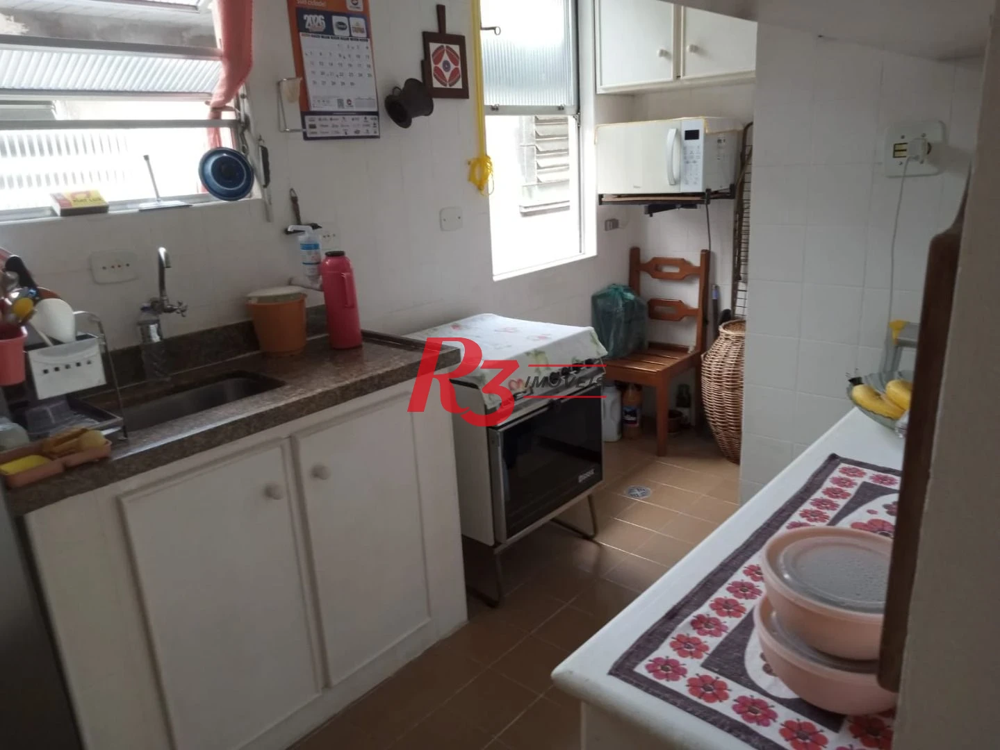 Apartamento com 2 dormitórios à venda, 57 m² por R$ 426.000,00 - Embaré - Santos/SP