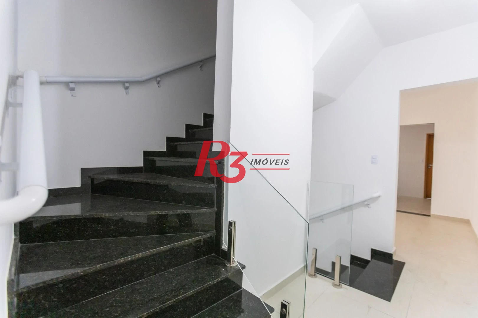 Casa com 3 dormitórios à venda, 150 m² por R$ 1.150.000,00 - Aparecida - Santos/SP