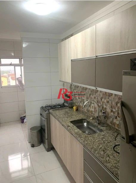 Apartamento com 2 dormitórios à venda, 57 m² por R$ 335.000,00 - Areia Branca - Santos/SP