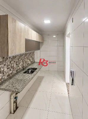 Apartamento com 2 dormitórios à venda, 57 m² por R$ 360.000,00 - Areia Branca - Santos/SP