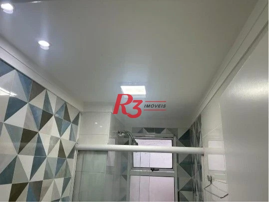 Apartamento com 2 dormitórios à venda, 57 m² por R$ 360.000,00 - Areia Branca - Santos/SP