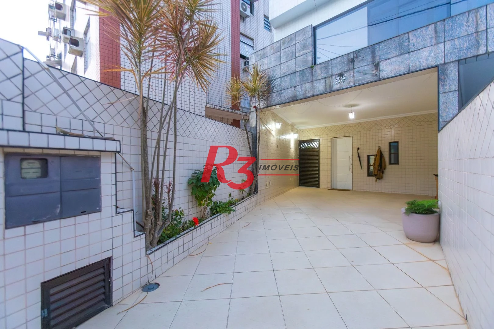 Casa com 3 dormitórios à venda, 250 m² por R$ 1.350.000,00 - Ponta da Praia - Santos/SP