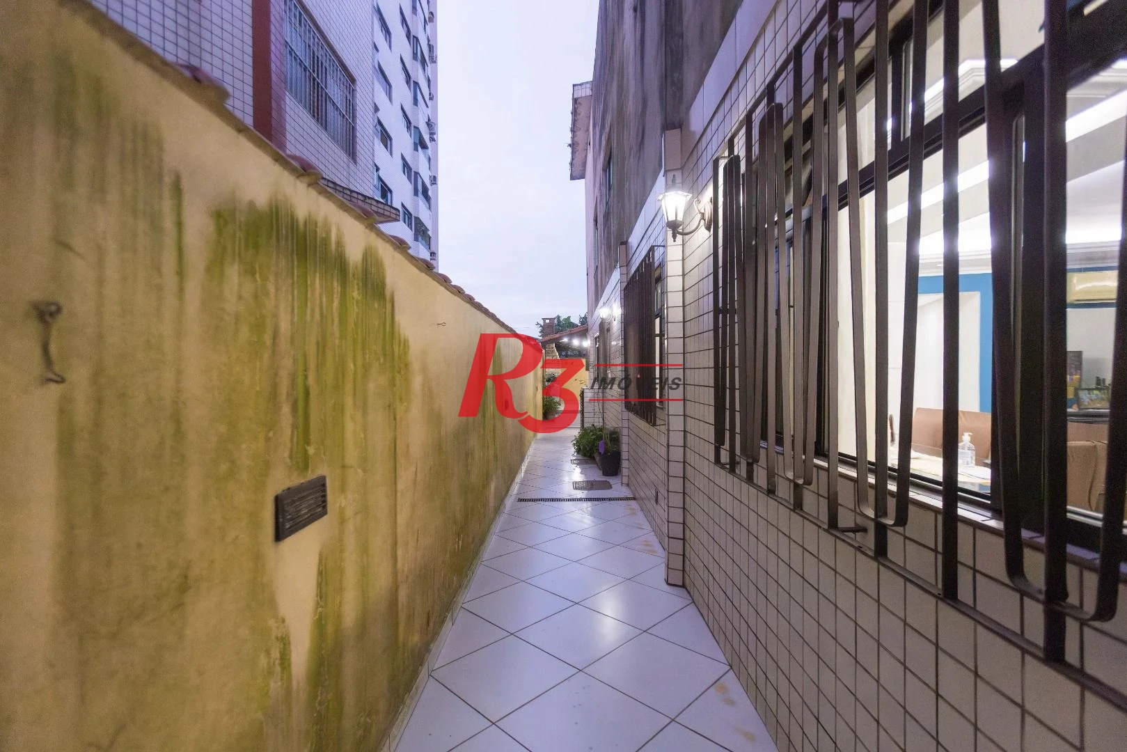 Casa com 3 dormitórios à venda, 250 m² por R$ 1.350.000,00 - Ponta da Praia - Santos/SP