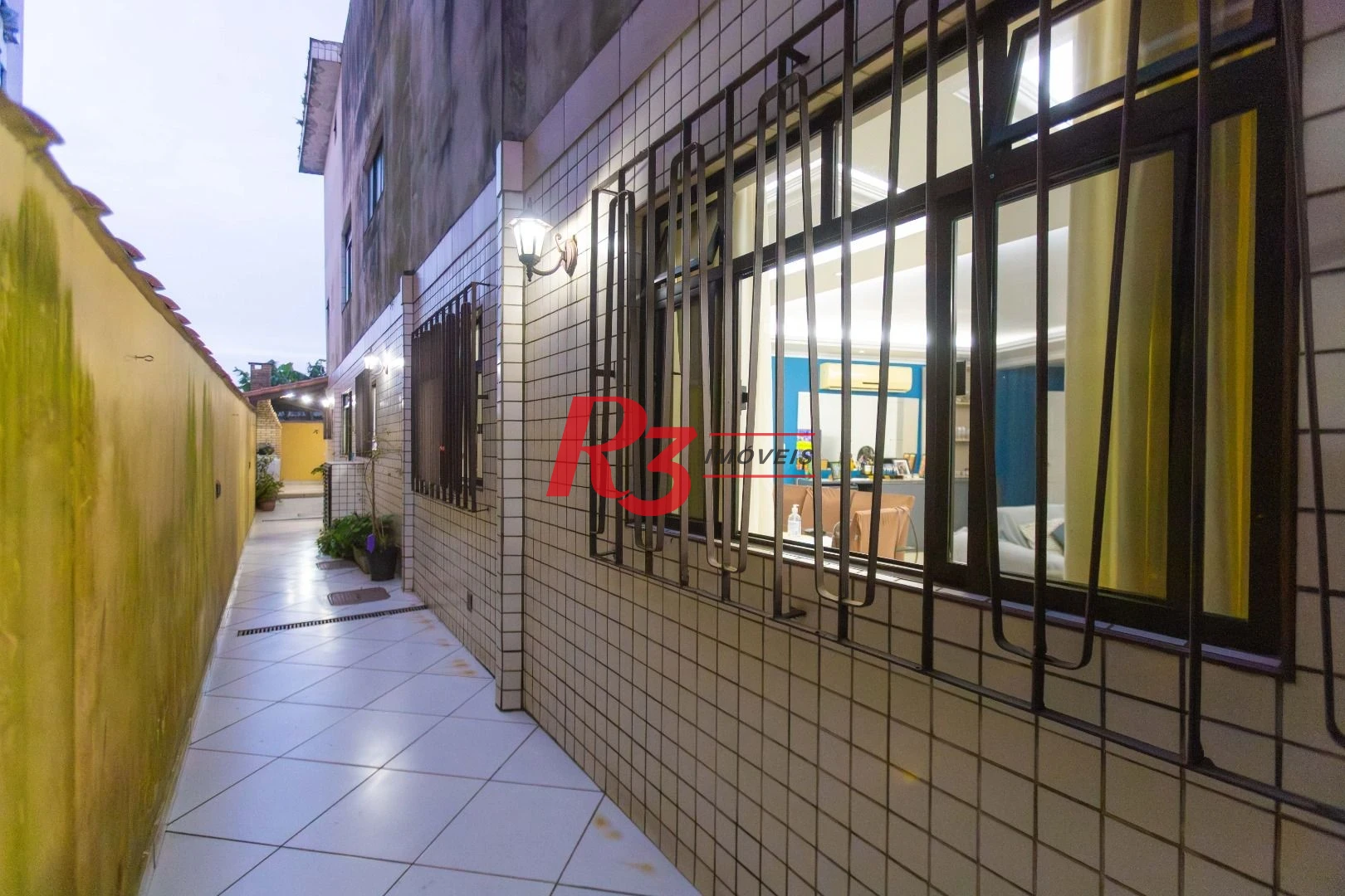 Casa com 3 dormitórios à venda, 250 m² por R$ 1.350.000,00 - Ponta da Praia - Santos/SP