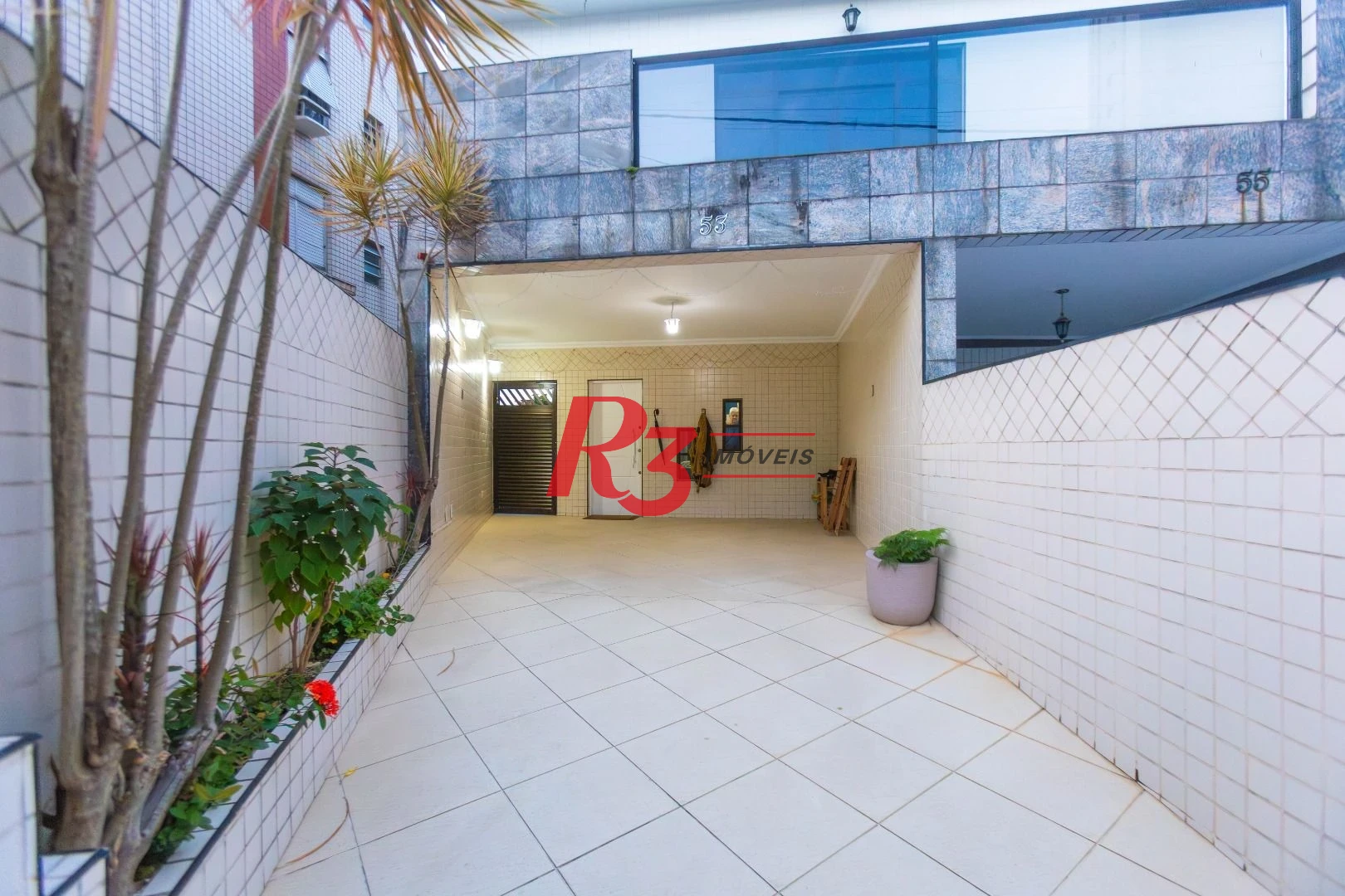 Casa com 3 dormitórios à venda, 250 m² por R$ 1.350.000,00 - Ponta da Praia - Santos/SP