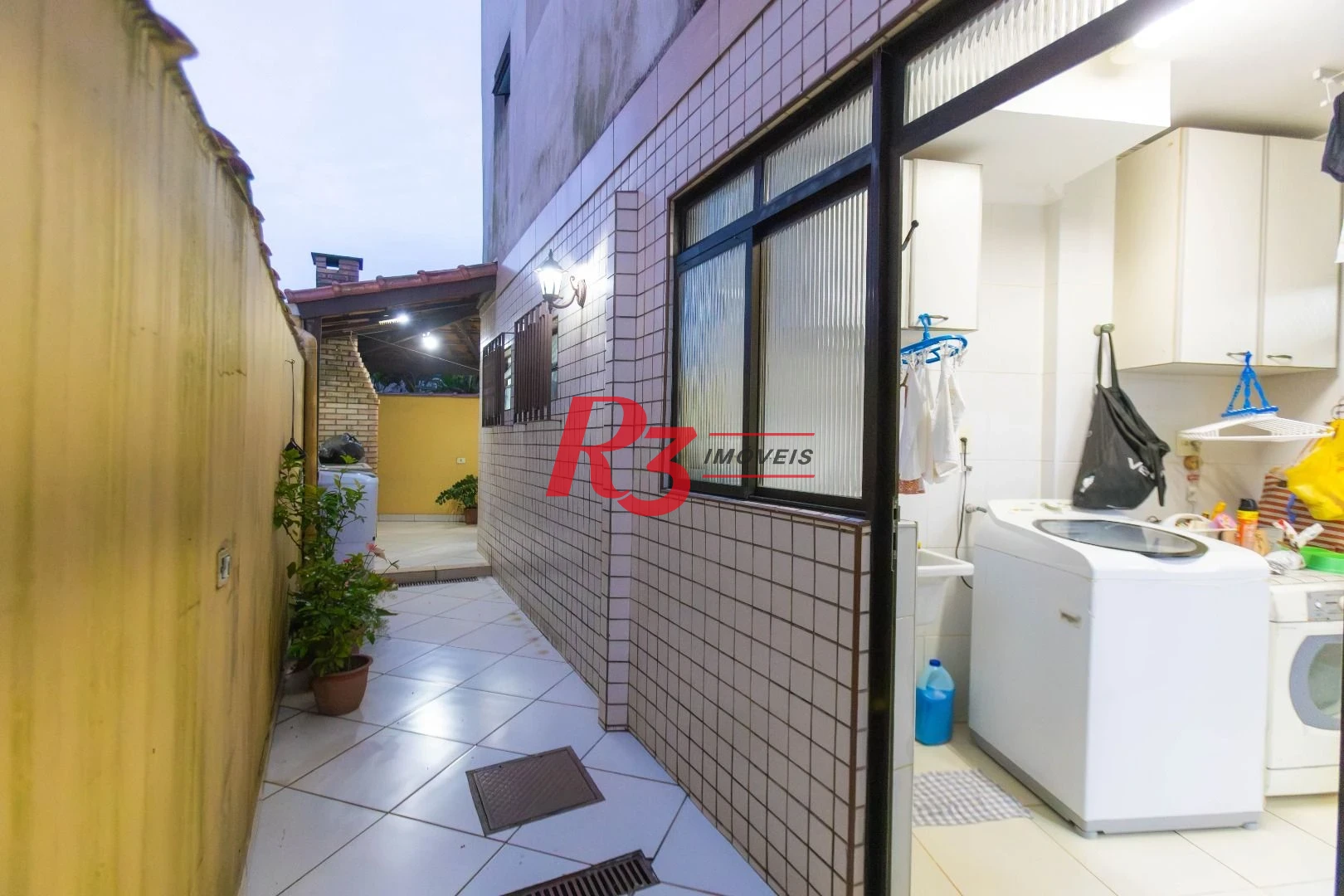 Casa com 3 dormitórios à venda, 250 m² por R$ 1.350.000,00 - Ponta da Praia - Santos/SP