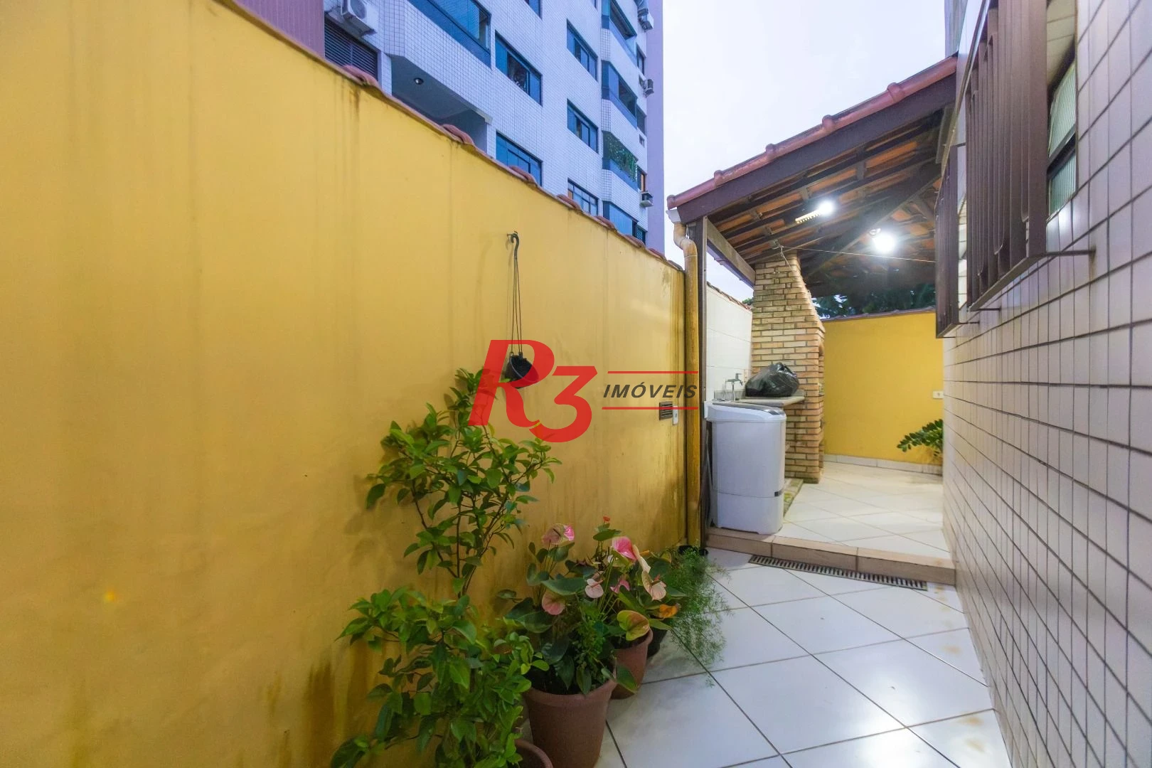 Casa com 3 dormitórios à venda, 250 m² por R$ 1.350.000,00 - Ponta da Praia - Santos/SP