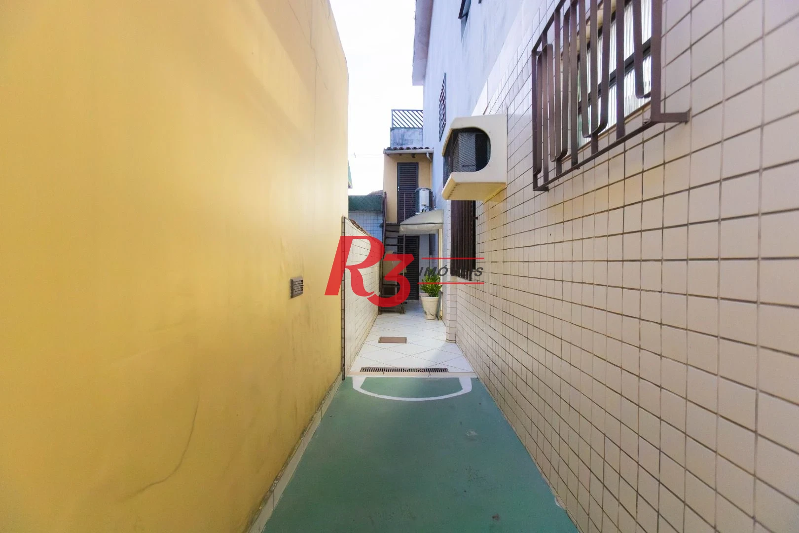 Casa com 3 dormitórios à venda, 250 m² por R$ 1.350.000,00 - Ponta da Praia - Santos/SP