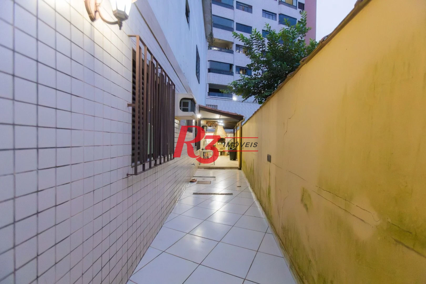 Casa com 3 dormitórios à venda, 250 m² por R$ 1.350.000,00 - Ponta da Praia - Santos/SP