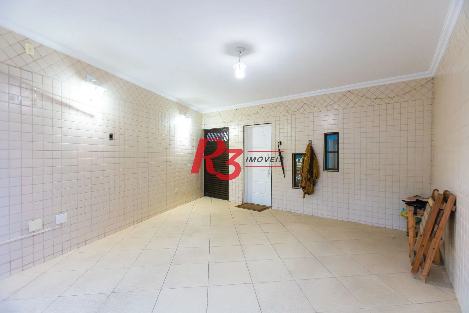 Casa com 3 dormitórios à venda, 250 m² por R$ 1.350.000,00 - Ponta da Praia - Santos/SP