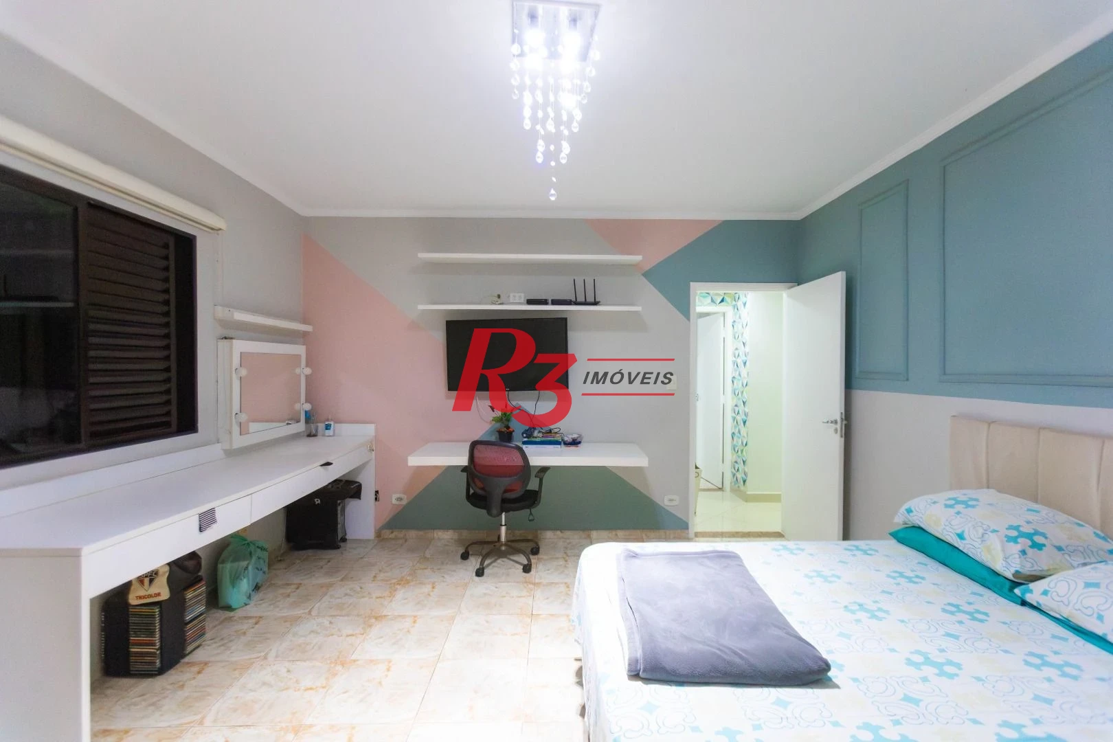 Casa com 3 dormitórios à venda, 250 m² por R$ 1.350.000,00 - Ponta da Praia - Santos/SP