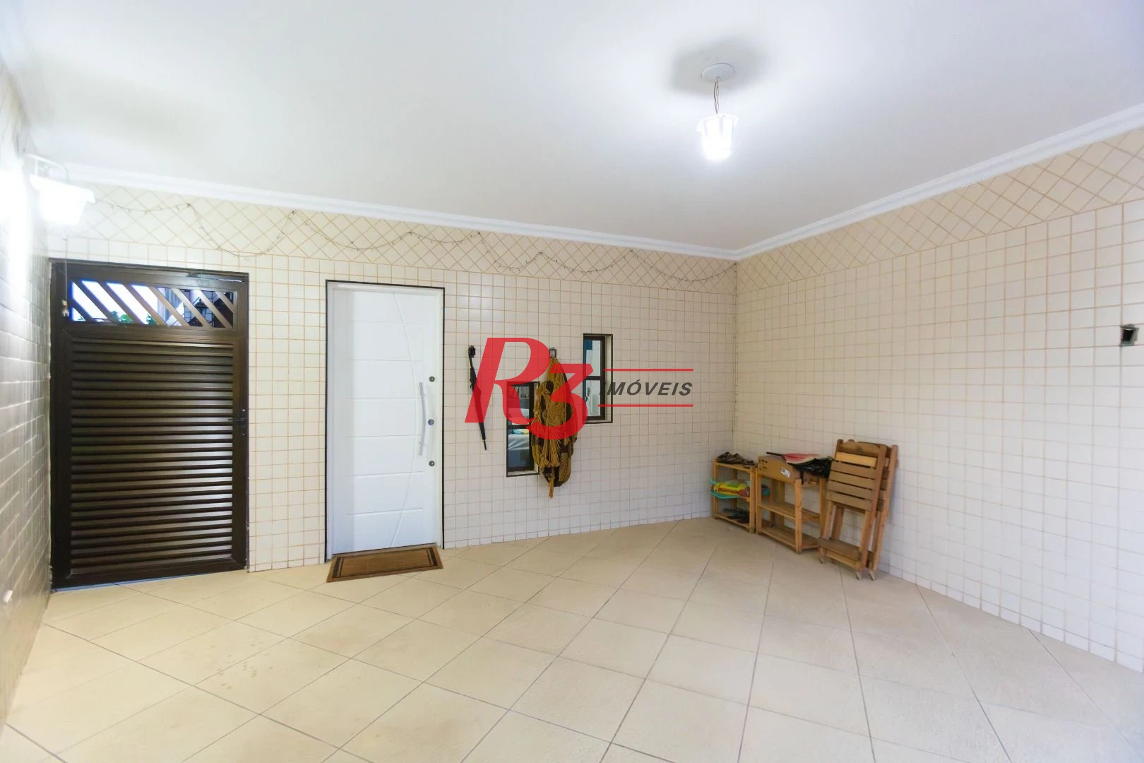 Casa com 3 dormitórios à venda, 250 m² por R$ 1.350.000,00 - Ponta da Praia - Santos/SP