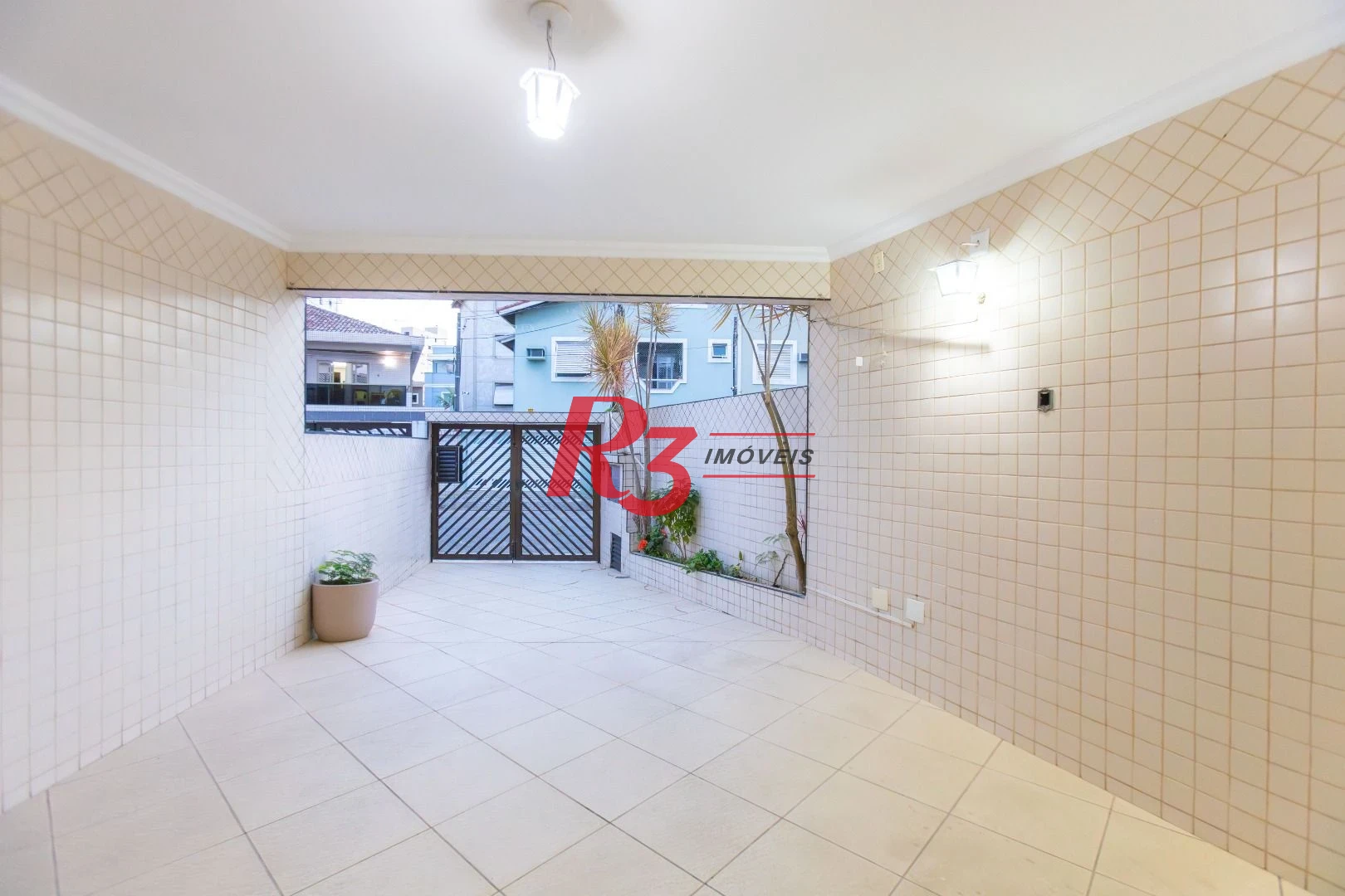 Casa com 3 dormitórios à venda, 250 m² por R$ 1.350.000,00 - Ponta da Praia - Santos/SP