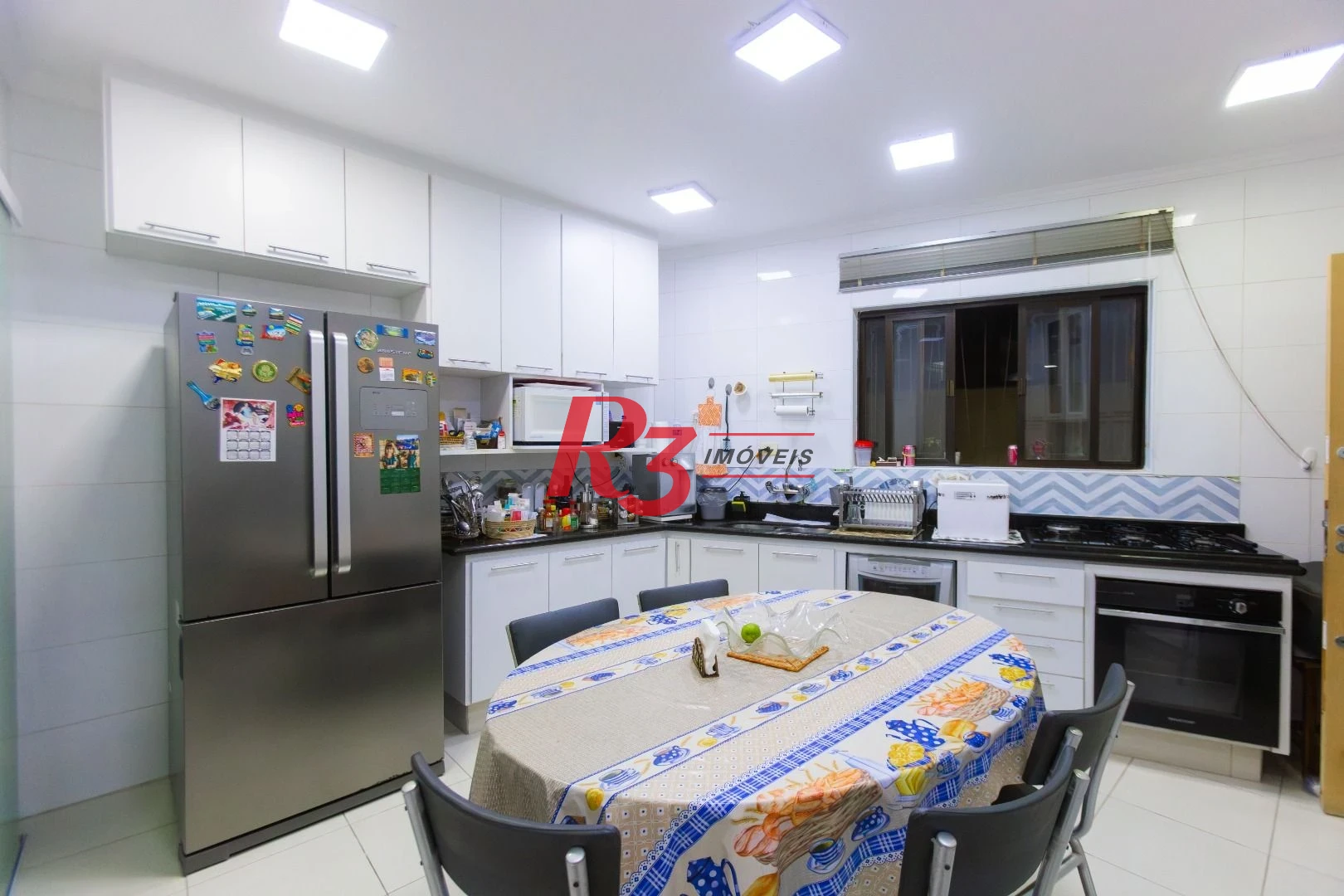 Casa com 3 dormitórios à venda, 250 m² por R$ 1.350.000,00 - Ponta da Praia - Santos/SP