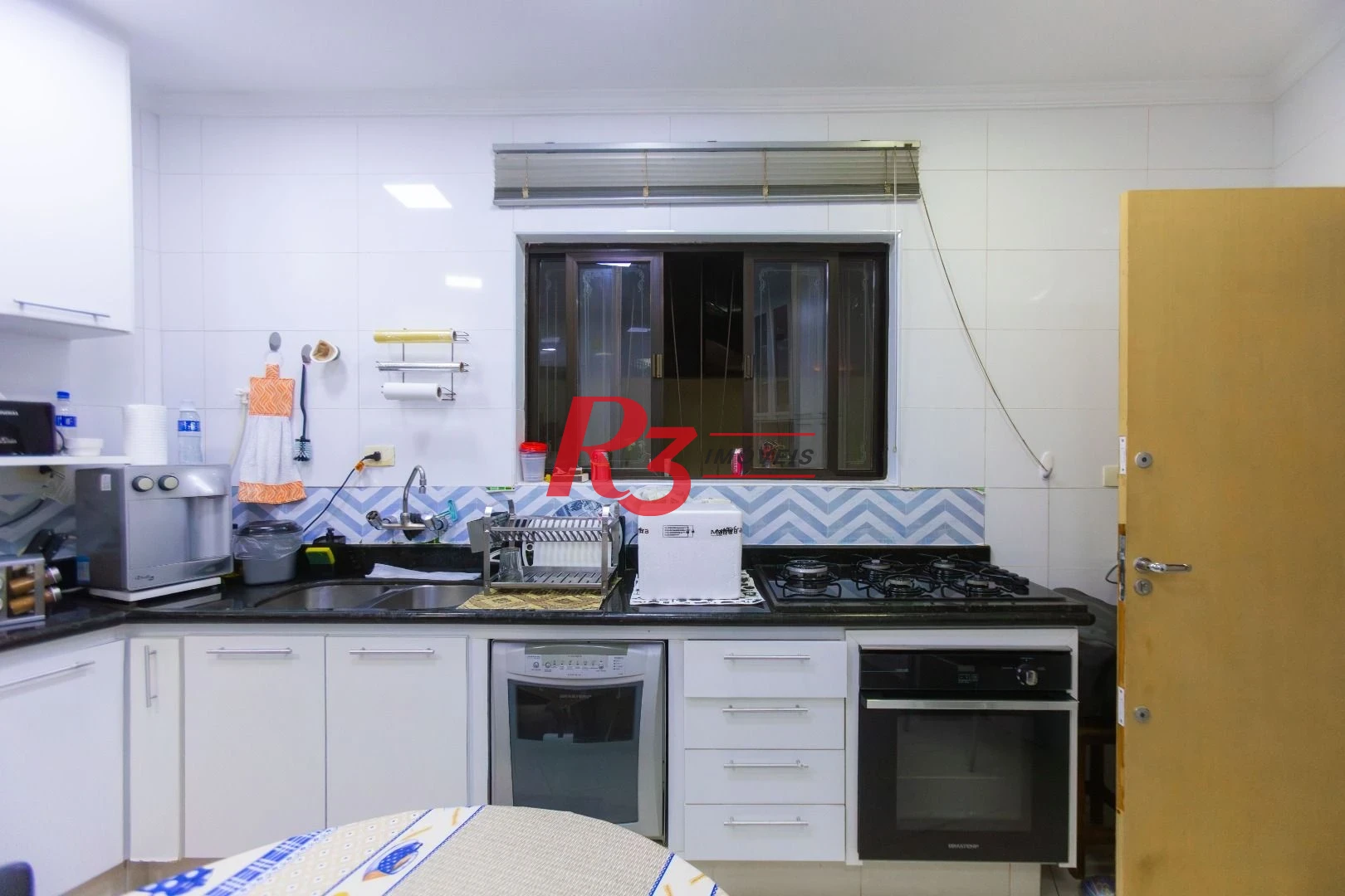 Casa com 3 dormitórios à venda, 250 m² por R$ 1.350.000,00 - Ponta da Praia - Santos/SP