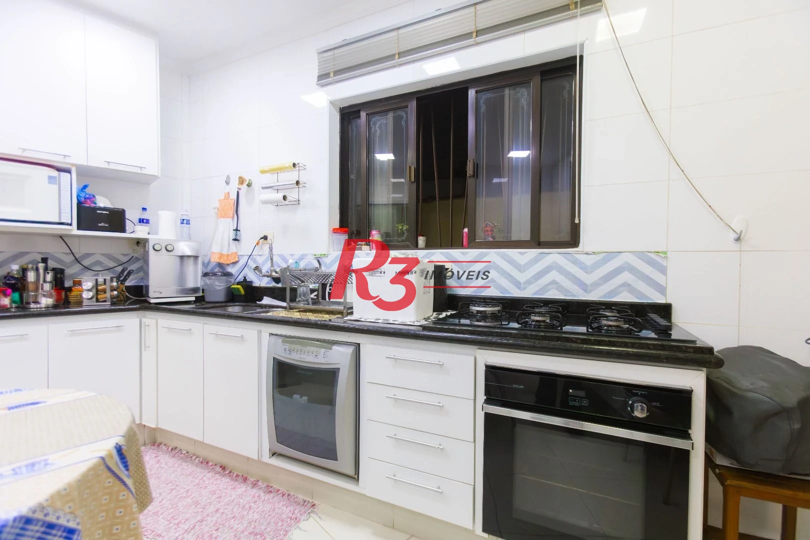 Casa com 3 dormitórios à venda, 250 m² por R$ 1.350.000,00 - Ponta da Praia - Santos/SP