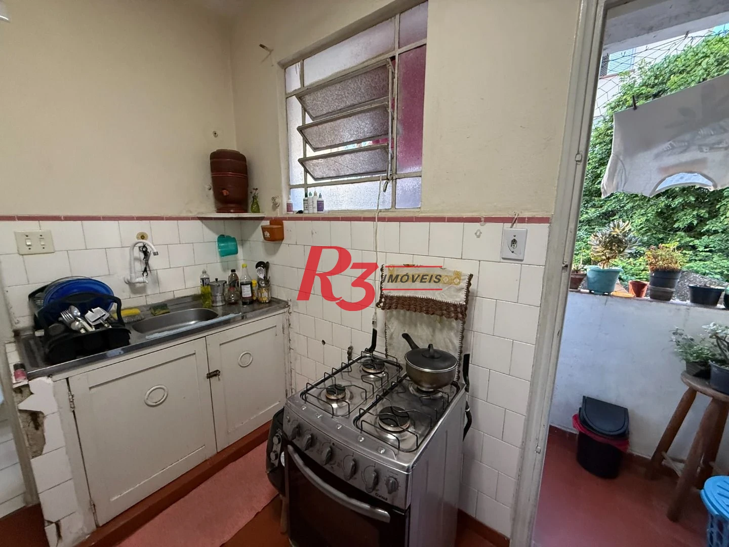 Apartamento com 2 dormitórios à venda, 66 m² por R$ 350.000,00 - Gonzaga - Santos/SP