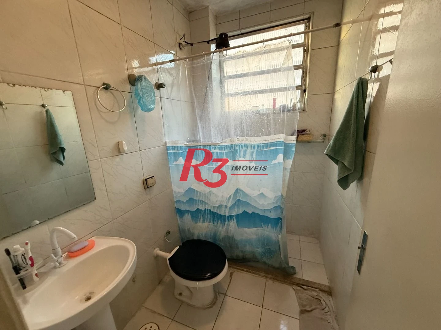 Apartamento com 2 dormitórios à venda, 66 m² por R$ 350.000,00 - Gonzaga - Santos/SP