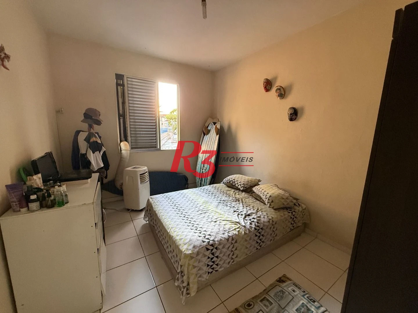 Apartamento com 2 dormitórios à venda, 66 m² por R$ 350.000,00 - Gonzaga - Santos/SP