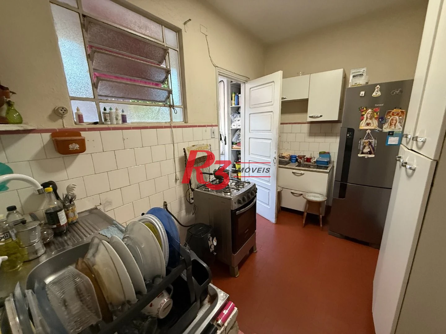 Apartamento com 2 dormitórios à venda, 66 m² por R$ 350.000,00 - Gonzaga - Santos/SP