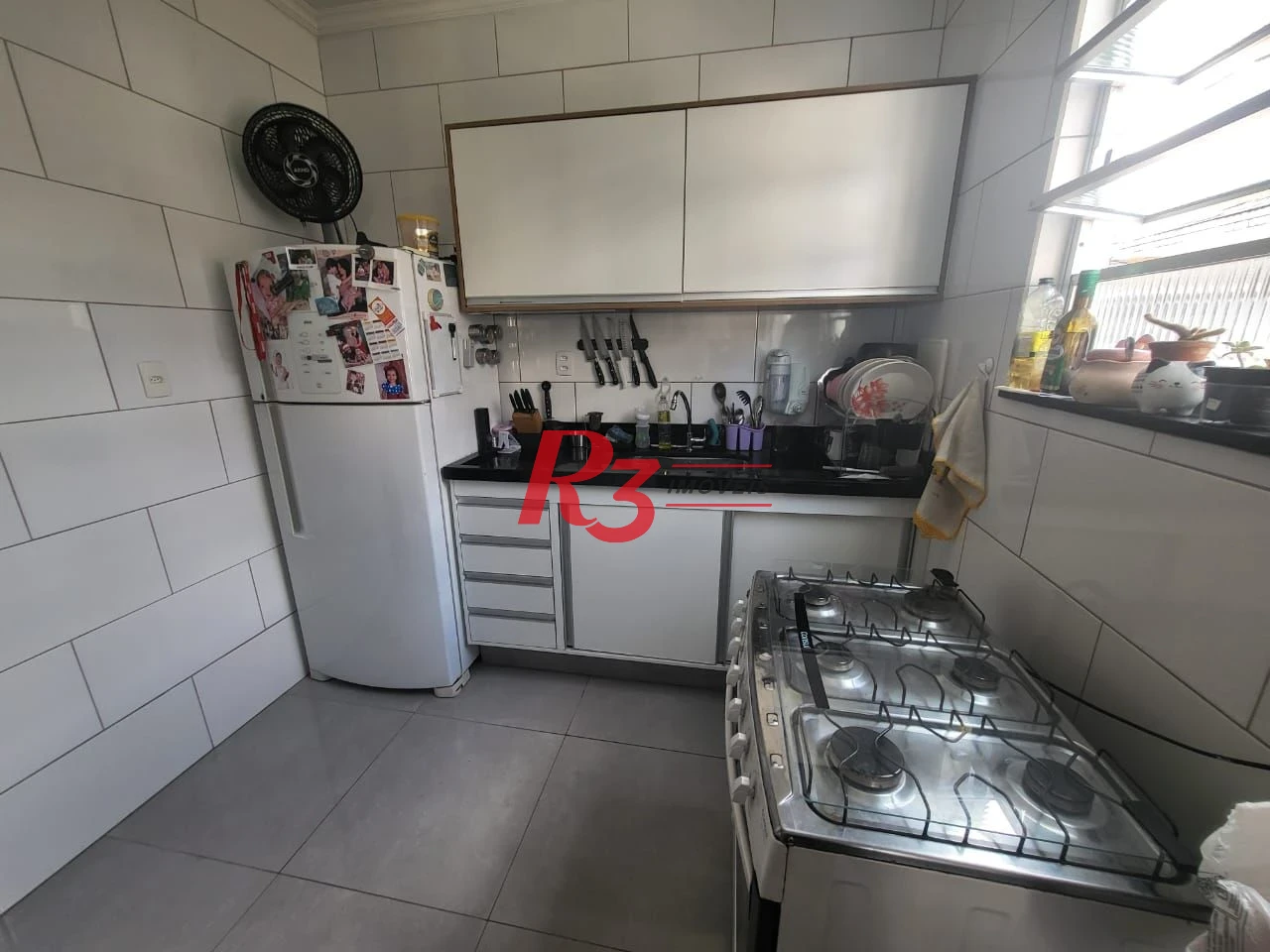 Apartamento com 2 dormitórios à venda, 65 m² por R$ 350.000,00 - Encruzilhada - Santos/SP