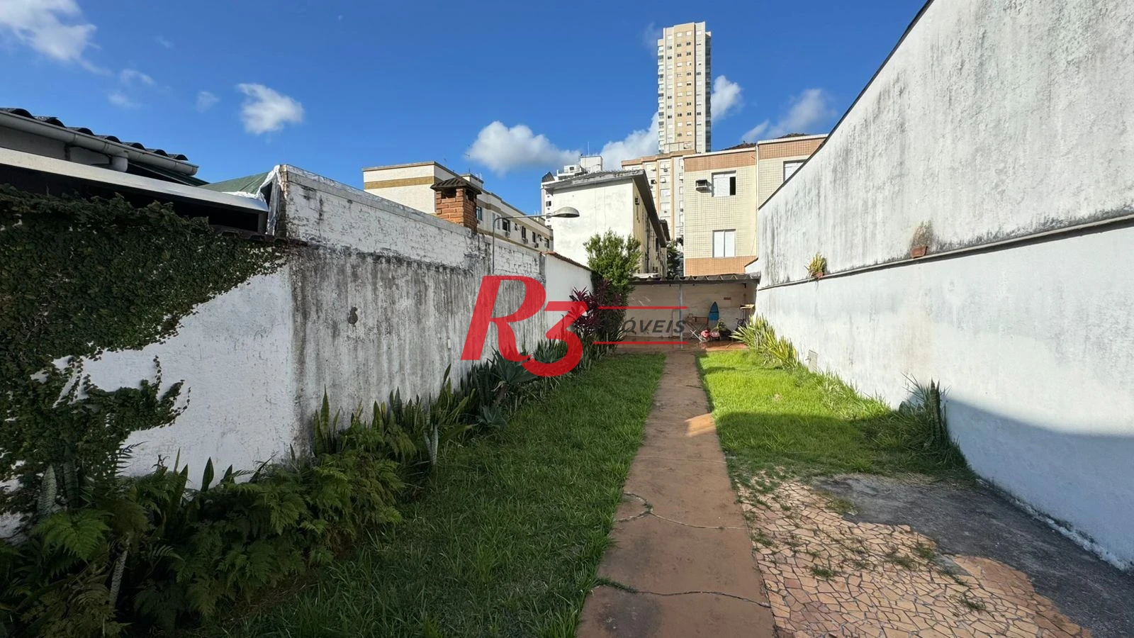 Sobrado com 3 dormitórios à venda, 134 m² por R$ 1.600.000,00 - Campo Grande - Santos/SP