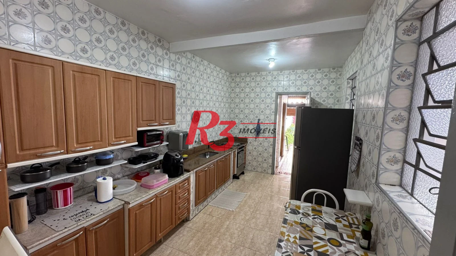 Sobrado com 3 dormitórios à venda, 134 m² por R$ 1.600.000,00 - Campo Grande - Santos/SP