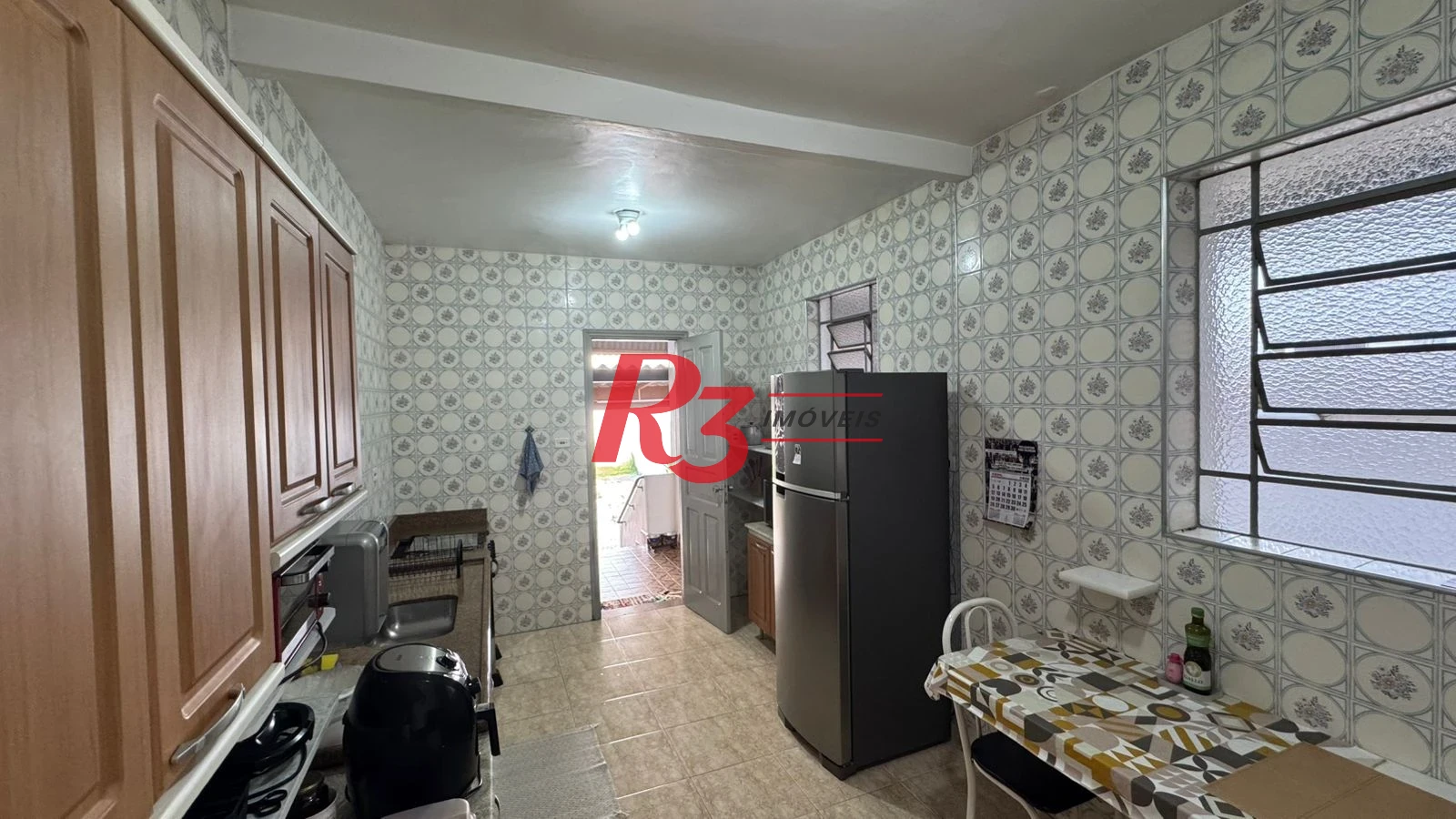 Sobrado com 3 dormitórios à venda, 134 m² por R$ 1.600.000,00 - Campo Grande - Santos/SP
