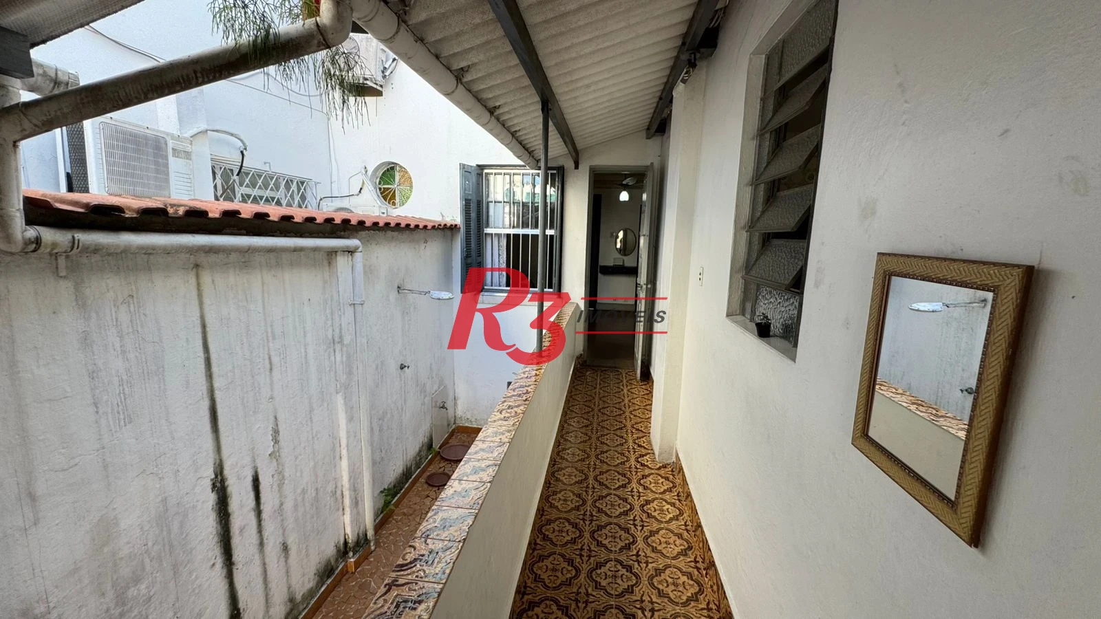 Sobrado com 3 dormitórios à venda, 134 m² por R$ 1.600.000,00 - Campo Grande - Santos/SP