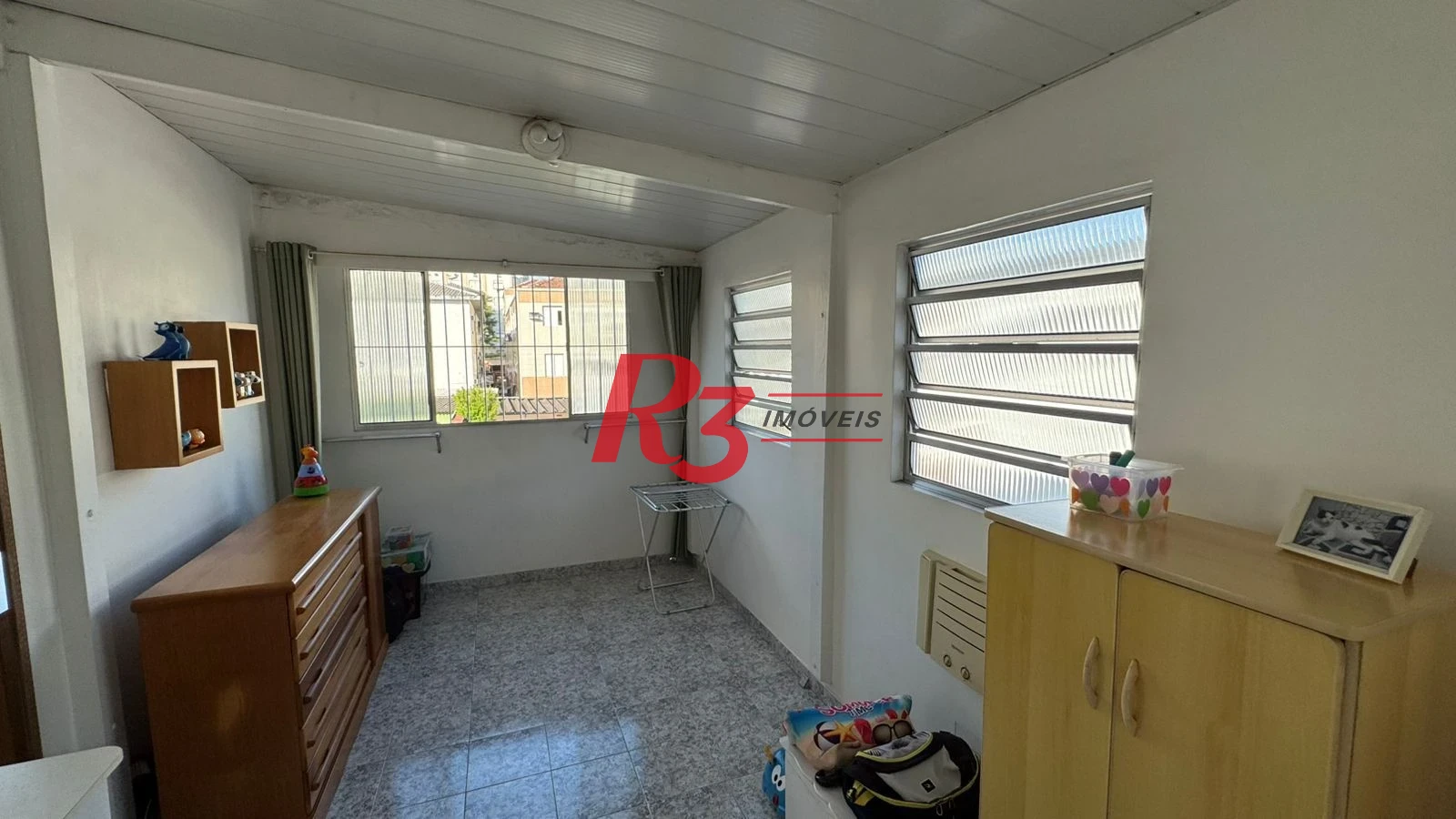 Sobrado com 3 dormitórios à venda, 134 m² por R$ 1.600.000,00 - Campo Grande - Santos/SP
