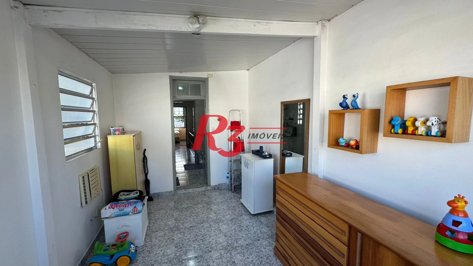 Sobrado com 3 dormitórios à venda, 134 m² por R$ 1.600.000,00 - Campo Grande - Santos/SP