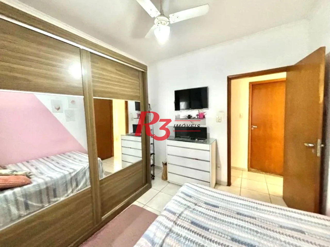 Casa com 3 dormitórios à venda, 152 m² por R$ 860.000,00 - Aparecida - Santos/SP