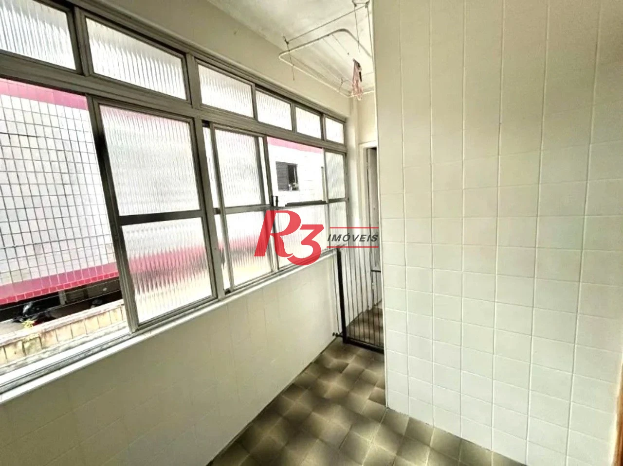 Casa com 3 dormitórios à venda, 152 m² por R$ 860.000,00 - Aparecida - Santos/SP