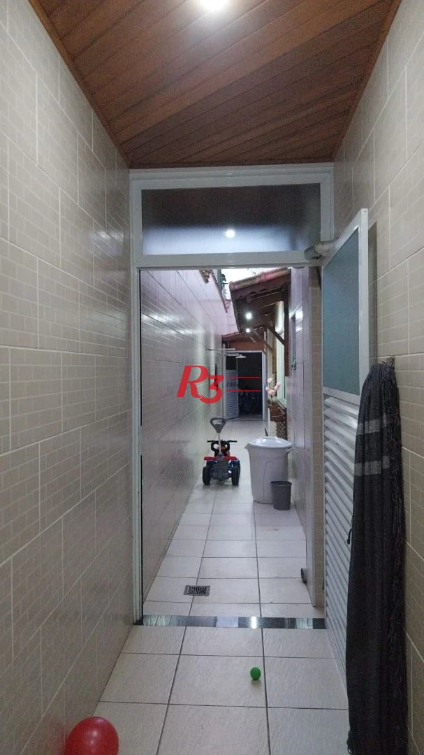 Sobrado com 3 dormitórios à venda, 180 m² por R$ 590.000,00 - Vila Mateo Bei - São Vicente/SP