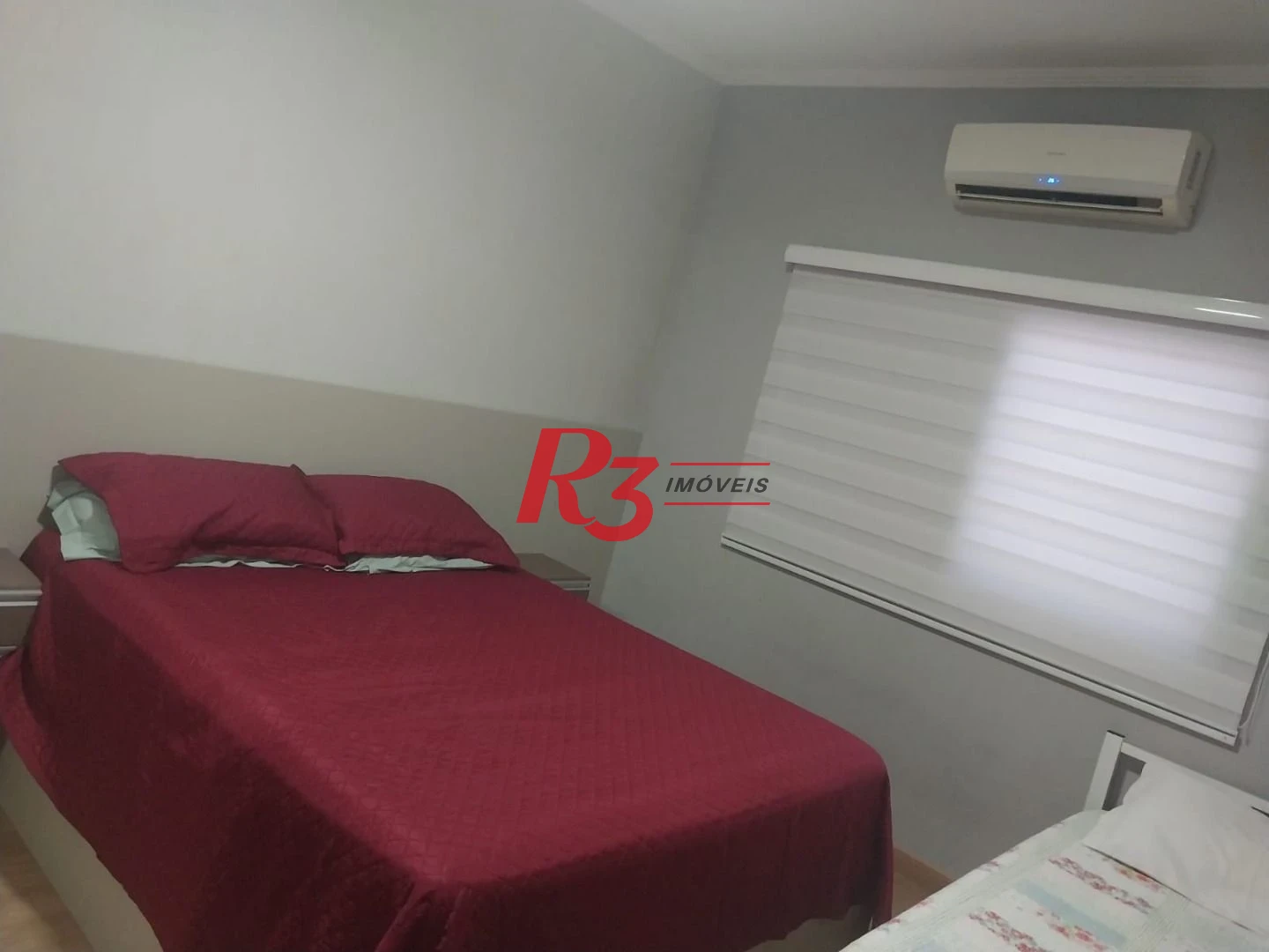 Sobrado com 3 dormitórios à venda, 180 m² por R$ 590.000,00 - Vila Mateo Bei - São Vicente/SP