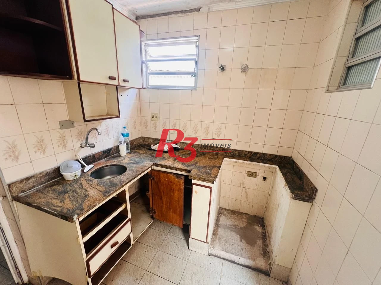 Sobrado com 3 dormitórios à venda, 311 m² por R$ 3.000.000,00 - Embaré - Santos/SP