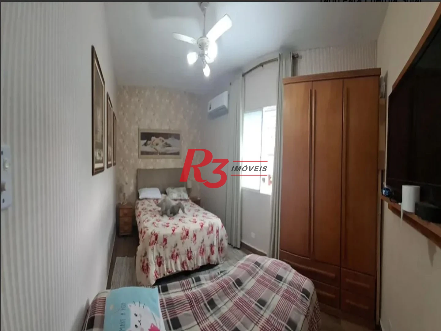 Sobrado com 3 dormitórios à venda, 134 m² por R$ 970.000,00 - Embaré - Santos/SP