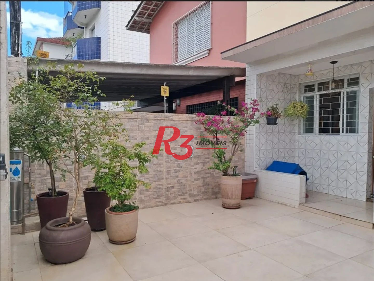 Sobrado com 3 dormitórios à venda, 134 m² por R$ 970.000,00 - Embaré - Santos/SP