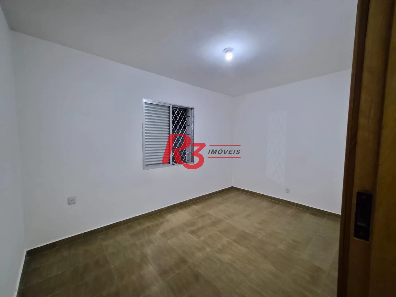 Apartamento com 2 dormitórios à venda, 63 m² por R$ 400.000,00 - Embaré - Santos/SP