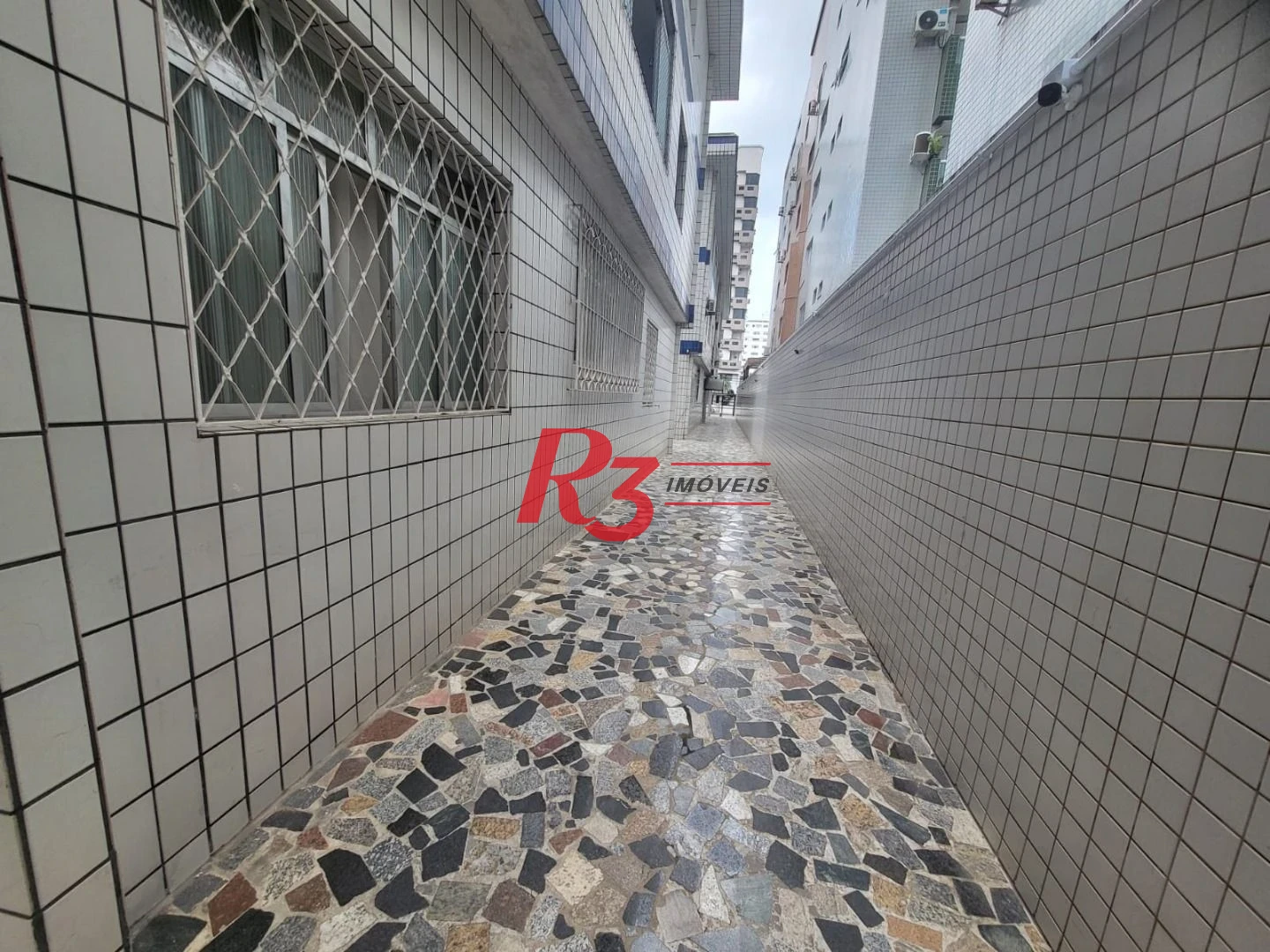 Apartamento com 2 dormitórios à venda, 63 m² por R$ 400.000,00 - Embaré - Santos/SP