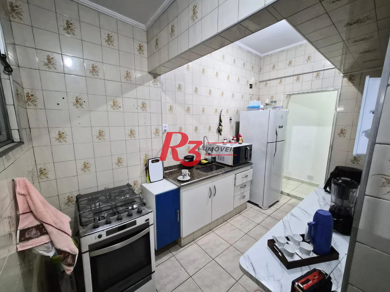 Apartamento com 2 dormitórios à venda, 63 m² por R$ 400.000,00 - Embaré - Santos/SP