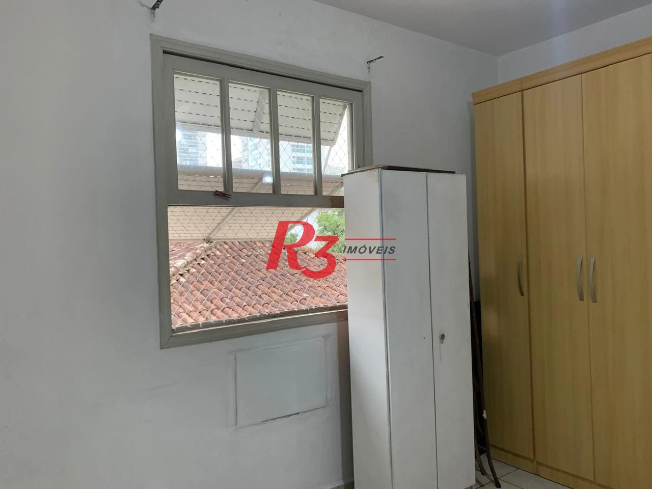 Apartamento com 2 dormitórios à venda, 70 m² por R$ 400.000,00 - Embaré - Santos/SP