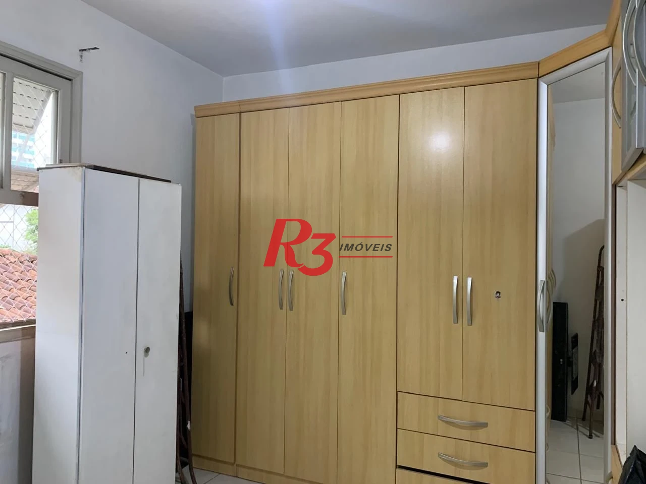 Apartamento com 2 dormitórios à venda, 70 m² por R$ 400.000,00 - Embaré - Santos/SP