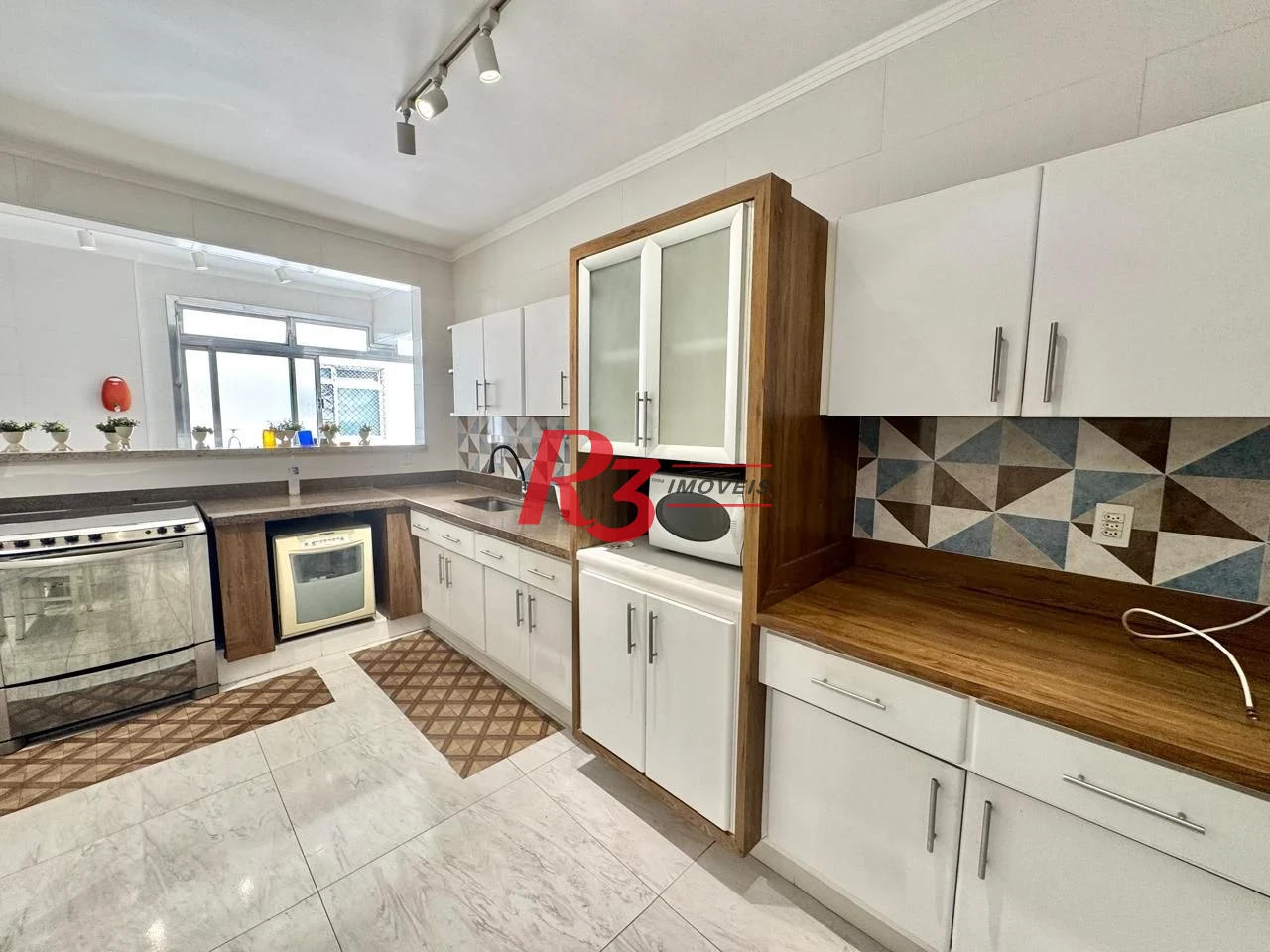 Apartamento com 3 dormitórios à venda, 142 m² por R$ 1.100.000,00 - Boqueirão - Santos/SP