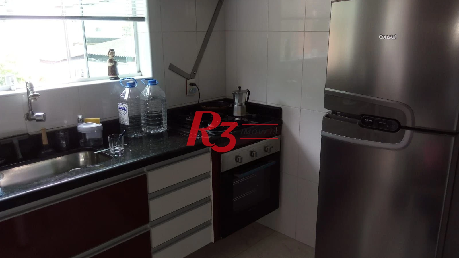 Casa com 3 dormitórios à venda, 130 m² por R$ 600.000,00 - Vila São Jorge - Santos/SP