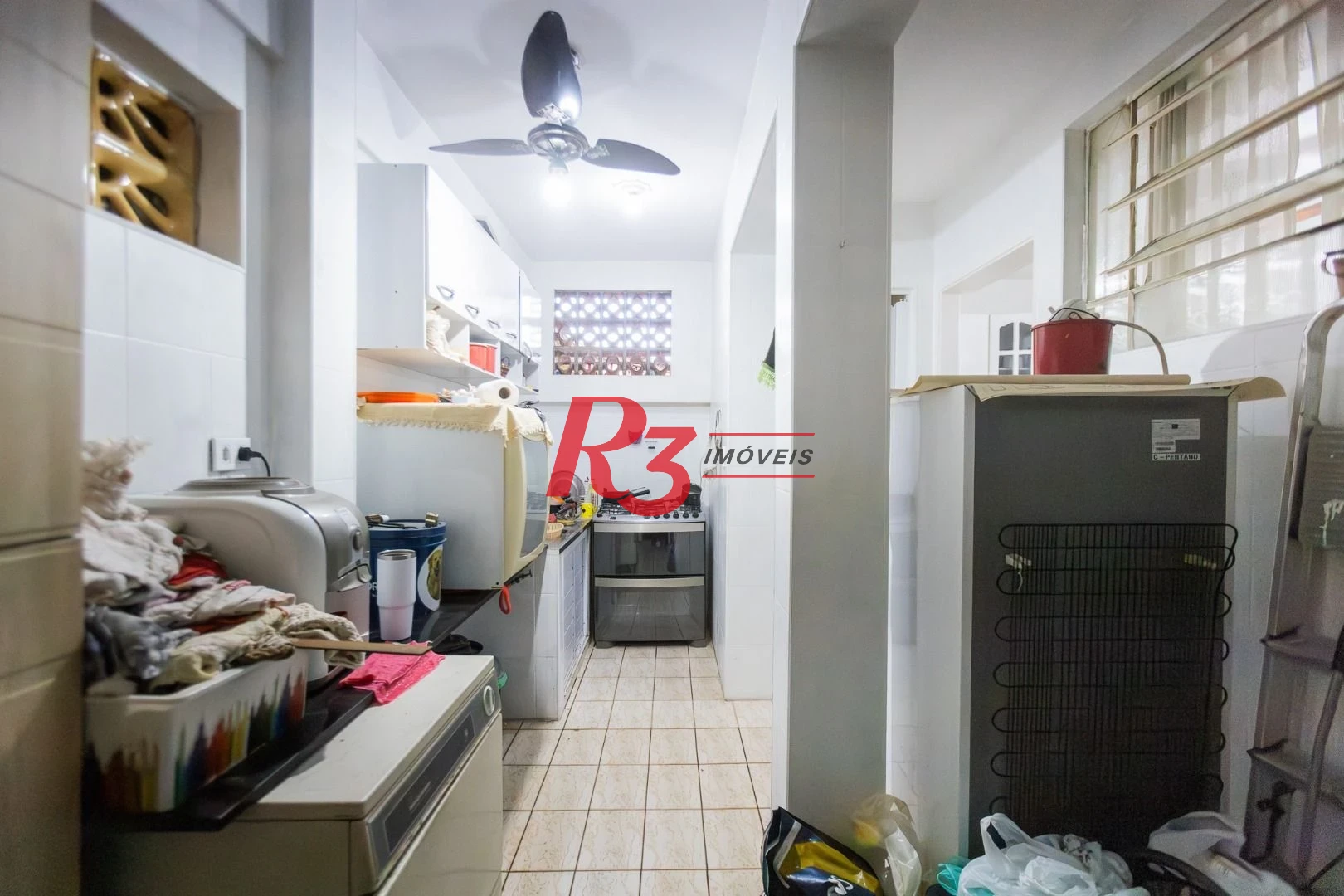Sobrado com 4 dormitórios à venda, 93 m² por R$ 650.000,00 - Estuário - Santos/SP