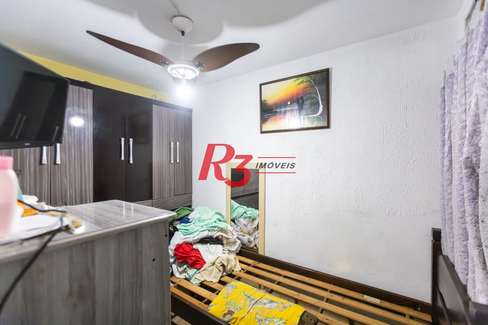 Sobrado com 4 dormitórios à venda, 93 m² por R$ 650.000,00 - Estuário - Santos/SP